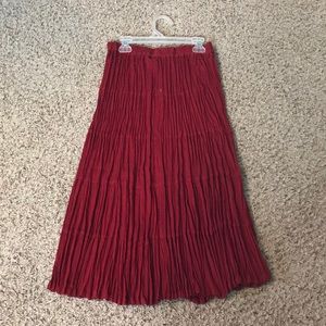Short red crinkle skirt